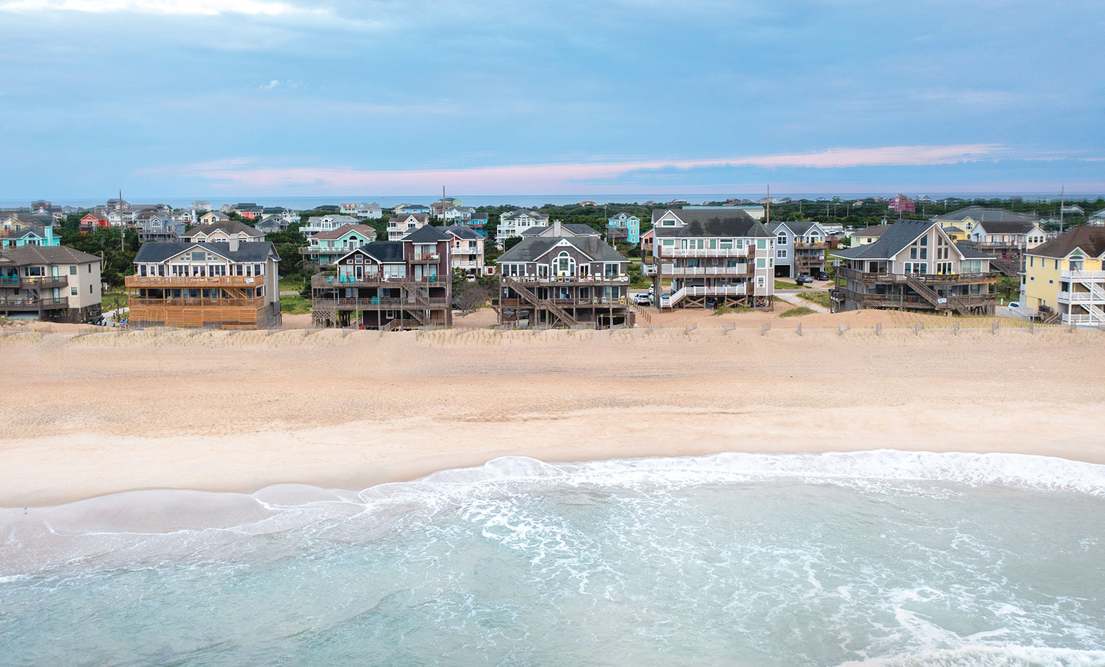 Historic resorts and nostalgic beaches along the NC coast, marking the journey from past leisure to contemporary beach vacations.